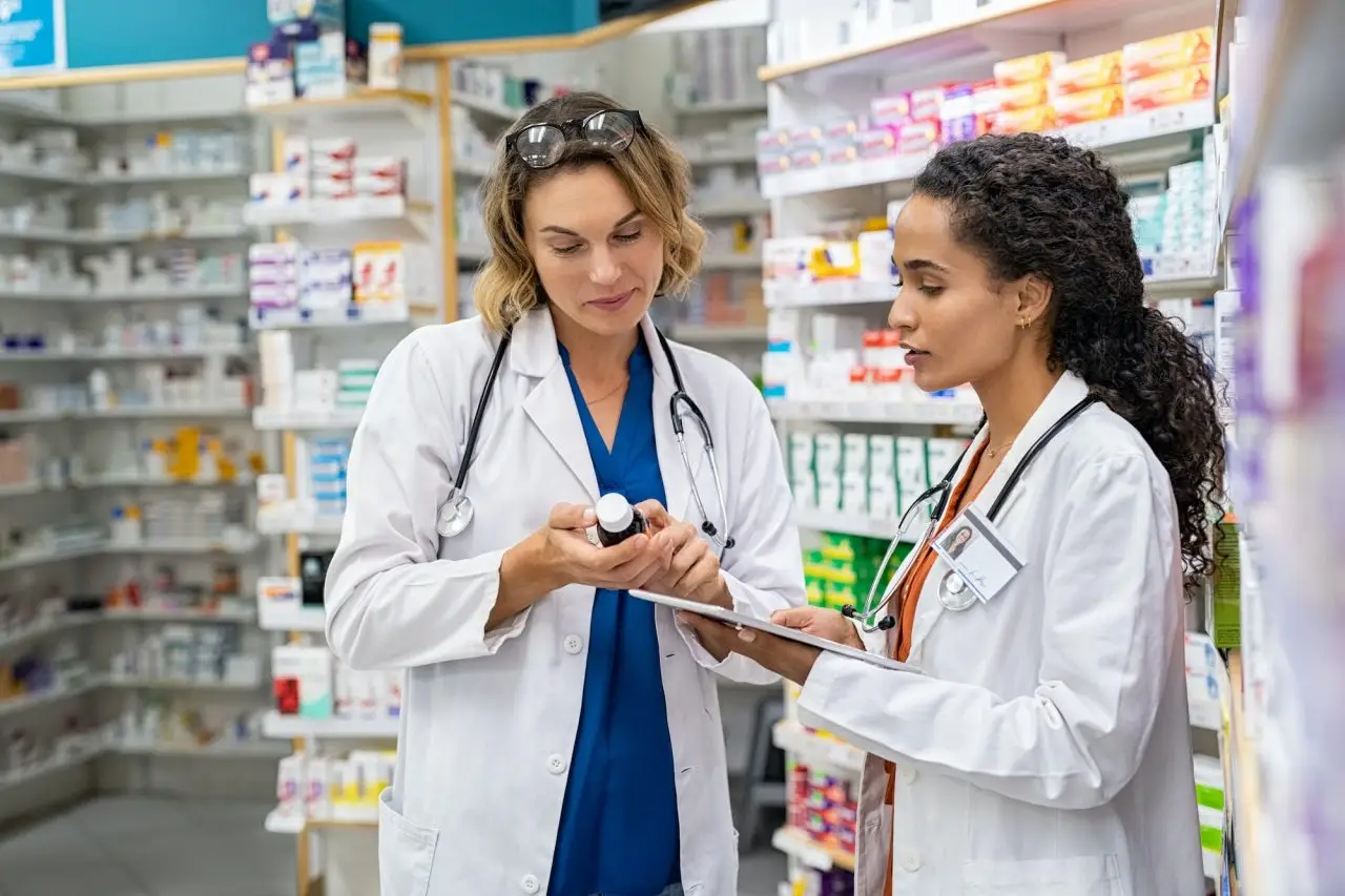 Two Pharmacists Working Together At Pharmacy Cabo San Lucas